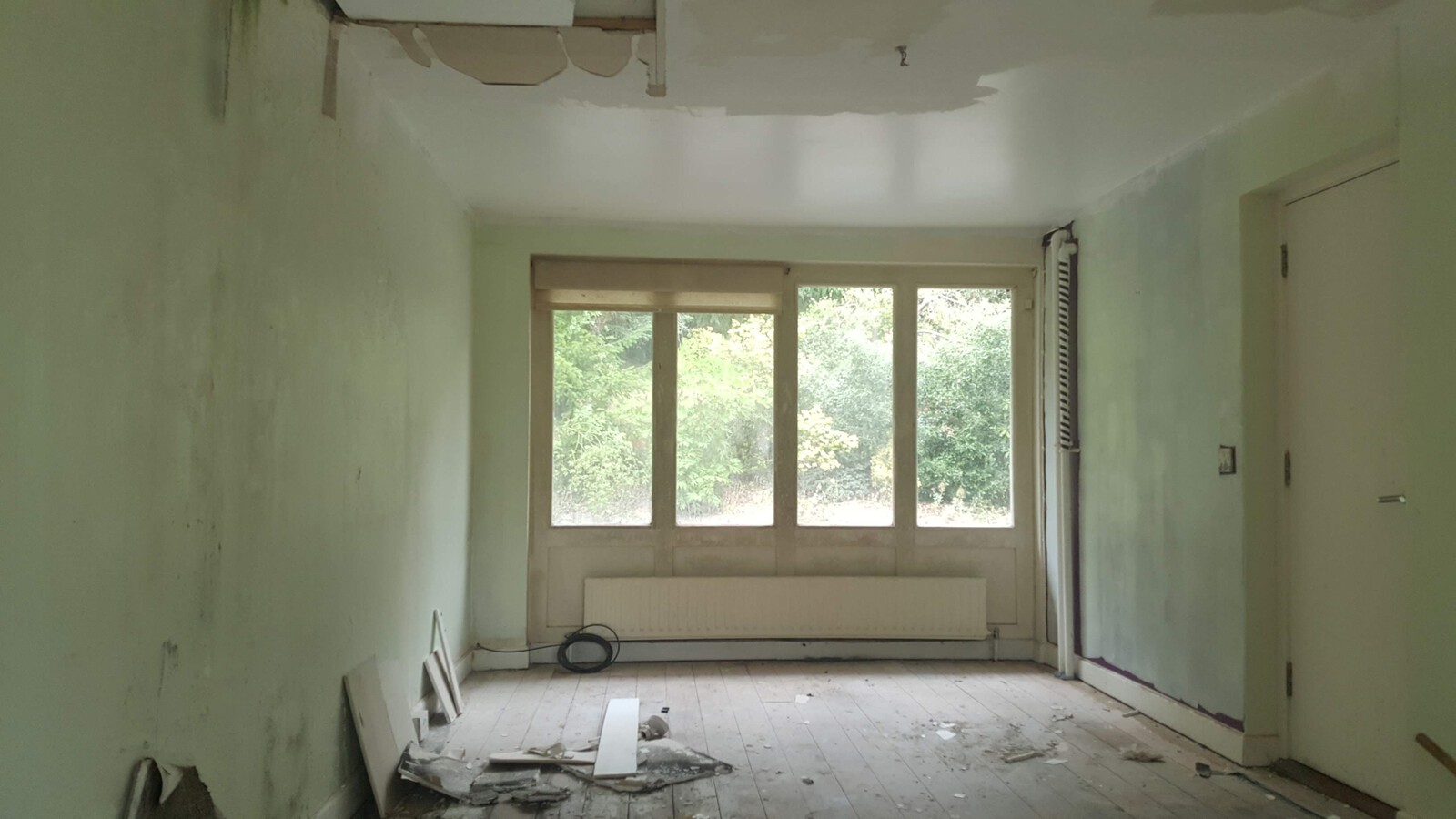 The space featured large windows overlooking the garden, and is connected directly to the home.