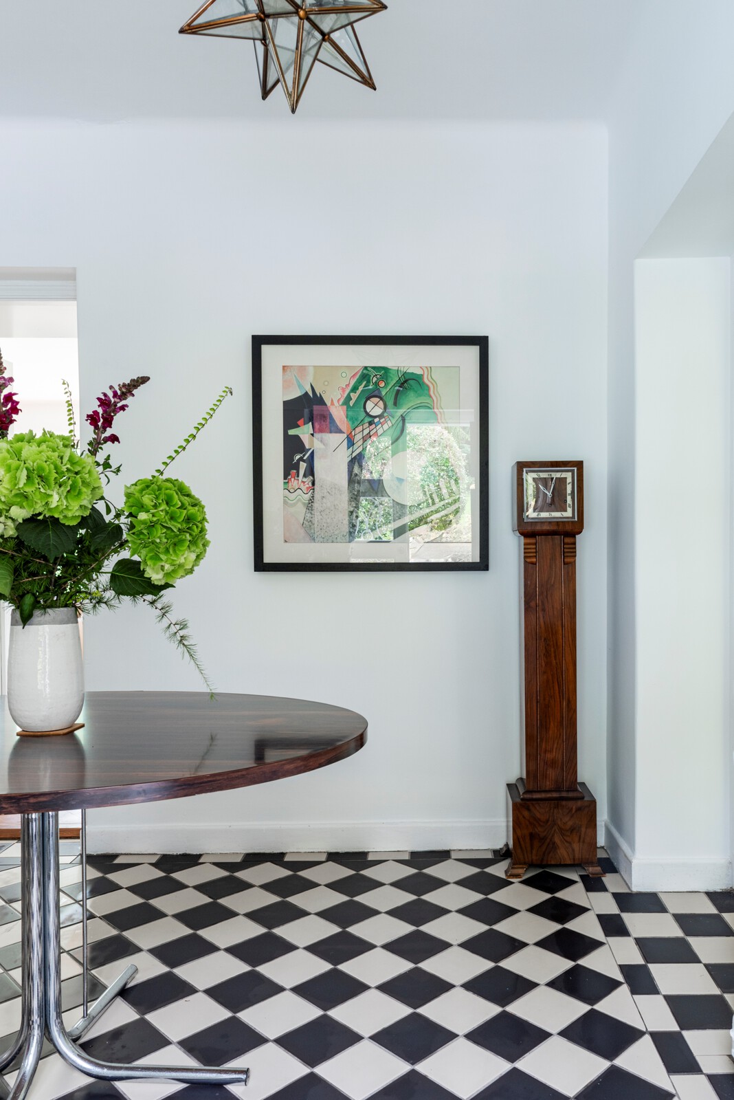 The original black and white tiles in the entrance hall.