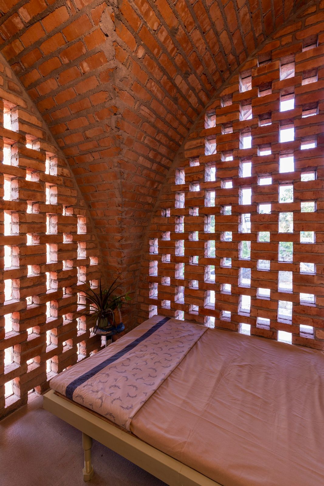 Supported by just four columns on the ground floor, the home's asymmetric groin vault was an ambitious structural experiment. 