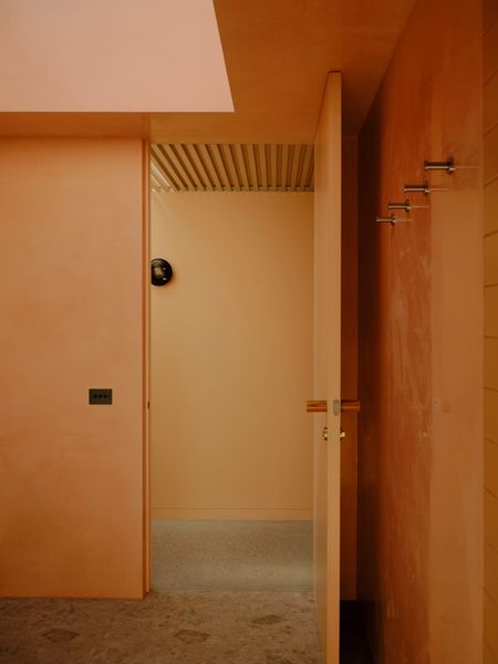The home is now defined by an evocative color palette as well as nods to the past—such as the terrazzo flooring.