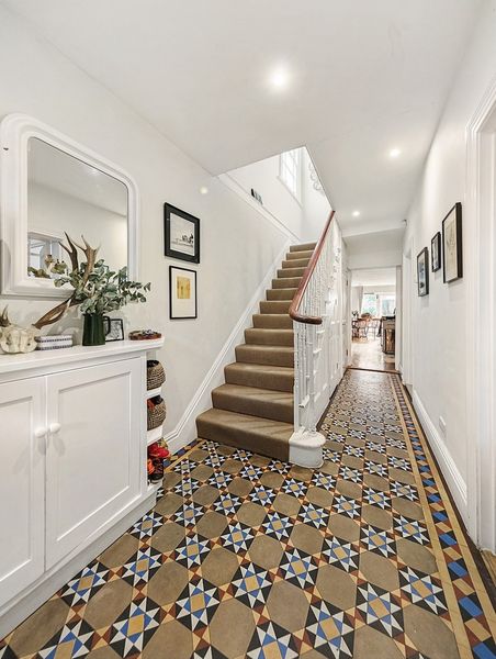 <span style="font-family: Theinhardt, -apple-system, BlinkMacSystemFont, "Segoe UI", Roboto, Oxygen-Sans, Ubuntu, Cantarell, "Helvetica Neue", sans-serif;">The existing entrance felt dated and worn, and was in need of updating—with the exception of the curved timber handrail on the stair. </span><span style="font-family: Theinhardt, -apple-system, BlinkMacSystemFont, "Segoe UI", Roboto, Oxygen-Sans, Ubuntu, Cantarell, "Helvetica Neue", sans-serif;">