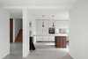 Modern home with Kitchen, White Cabinet, Concrete Floor, Wood Counter, Metal Counter, Pendant Lighting, and Concrete Counter. Kitchen Photo of C House