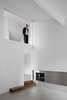 Modern home with Living Room and Concrete Floor. Window over living room Photo 7 of C House