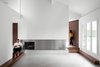 Modern home with Living Room and Concrete Floor. Living room and fire place Photo 8 of C House
