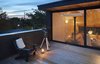 Modern home with Outdoor, Large Patio, Porch, Deck, Rooftop, Wood Patio, Porch, Deck, Wood Fences, Wall, and Decking Patio, Porch, Deck. An upper level outdoor terrace offers easy enjoyment of the city skyline, urban tree canopy, sunsets, and the night sky. Photo 5 of Bellwoods Lodge