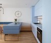 Modern home with Kitchen, Colorful Cabinet, and Pendant Lighting. Kitchen Photo of Lady