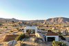 Modern home with Outdoor, Desert, Shrubs, Boulders, and Large Patio, Porch, Deck. Whisper Rock Ranch just north of Pioneertown, California. Photo of Whisper Rock Ranch