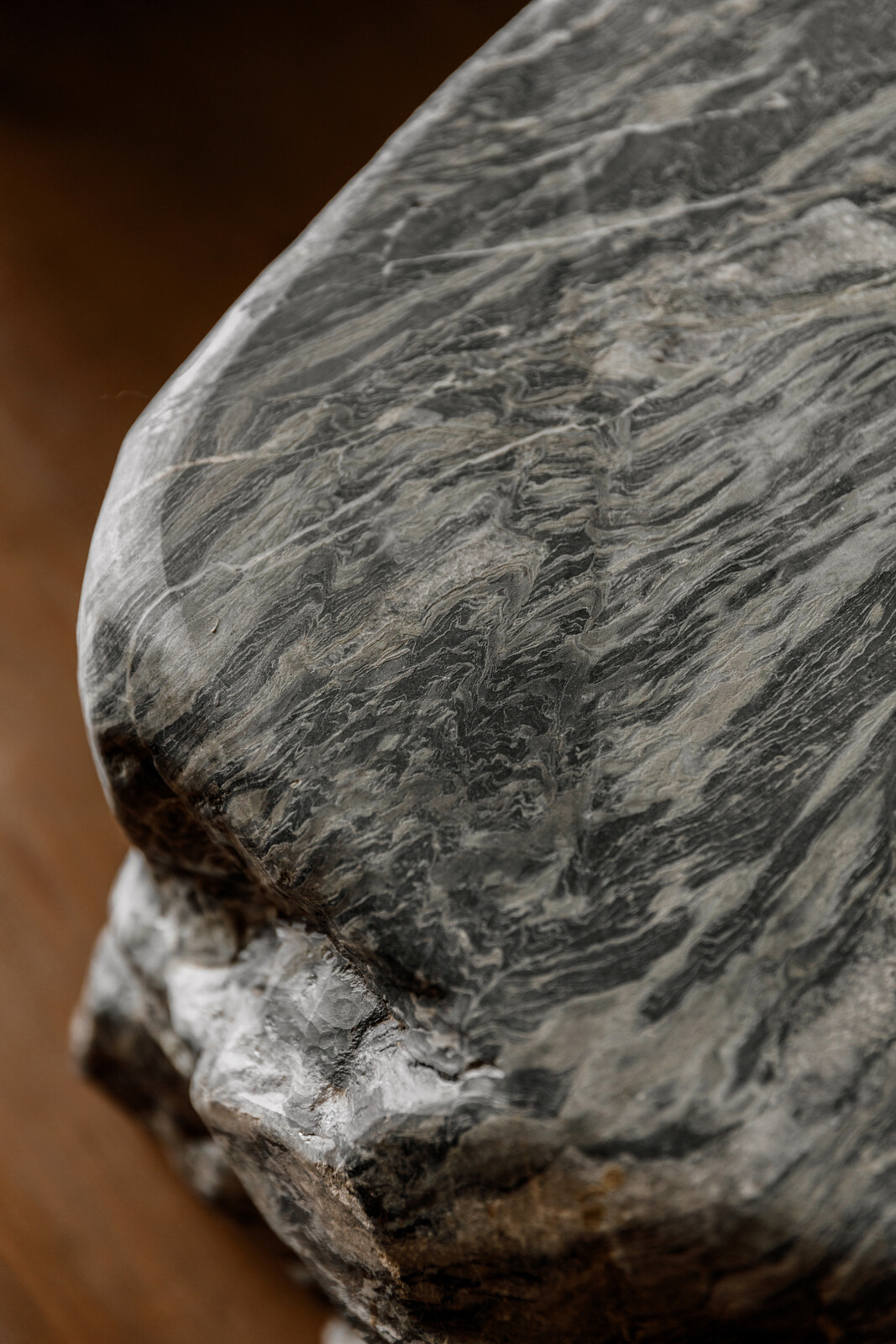 One of the heavy stone pieces is used as a coffee table. 