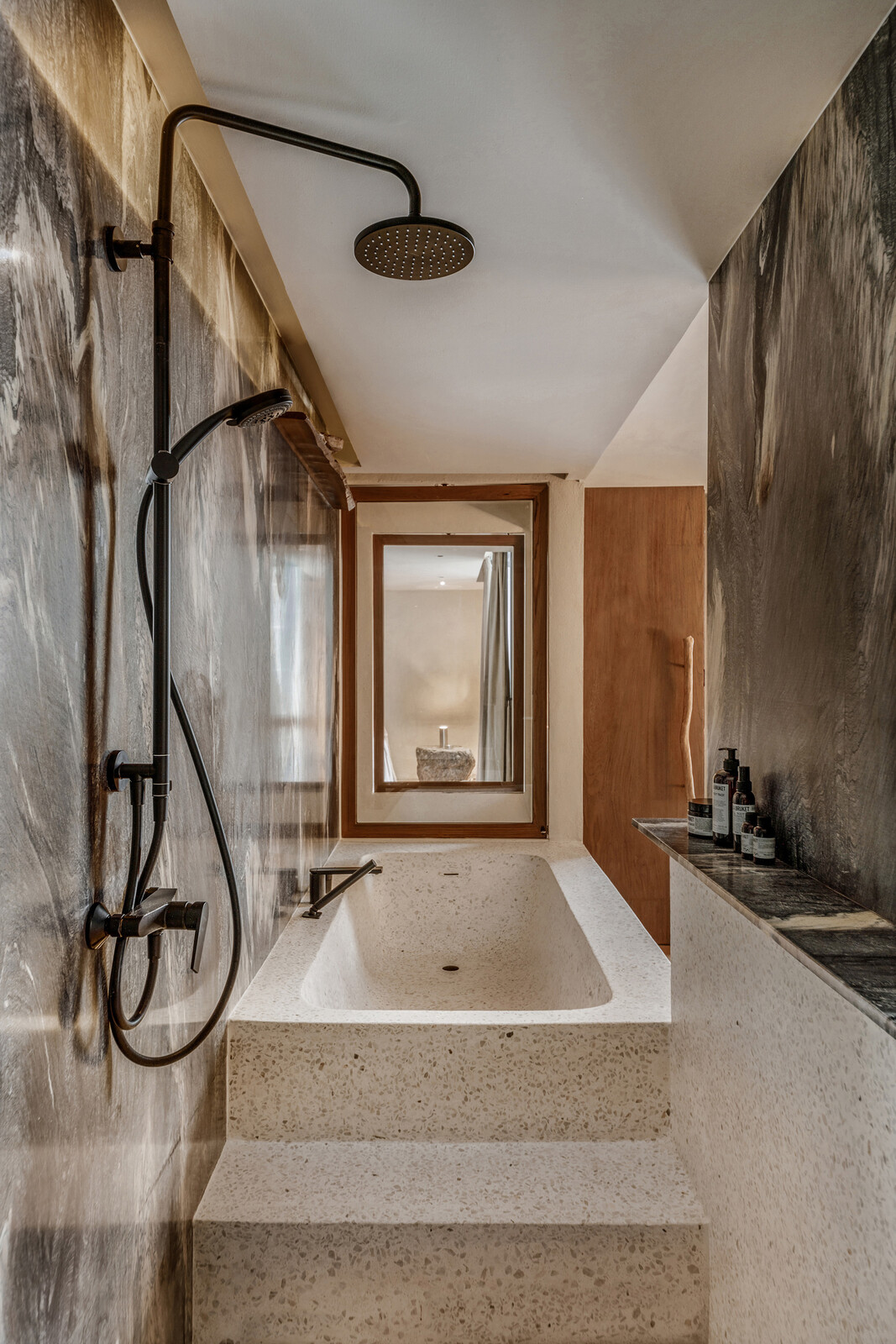 The master bathroom with  a built-in tub. 