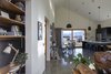 A fully insulated concrete floor provided enough thermal mass to absorb the solar
energy through the full height windows and doors. An energy efficient hydronic
underfloor heating system was installed to take the edge off during the cold
winter months. Photo 14 of Twin Peak House modern home