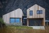 Modern home with Exterior and Wood Siding Material. In conclusion, this home is well equipped to withstand the harsh Central Otago
climate with a minimum of operational energy use. Its design features and
appearance are congruent with the clients brief and it connects and reflects the
natural beauty of the Central Otago landscape. Photo 16 of Twin Peak House