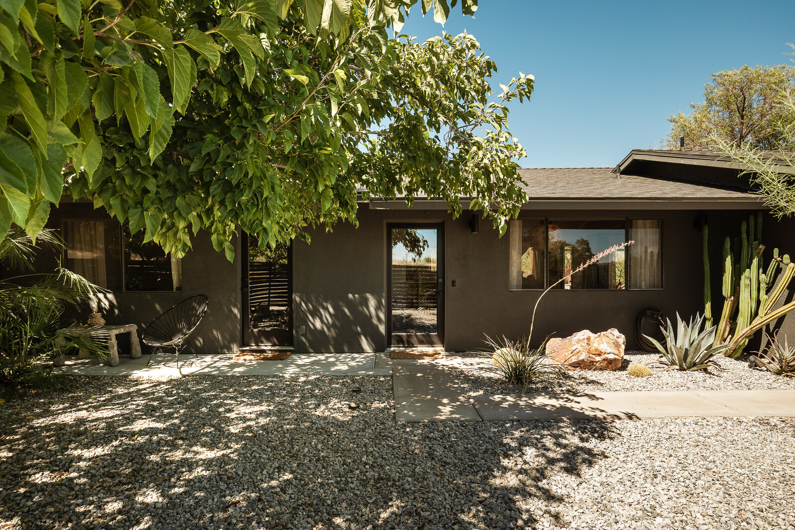 The property had several mature trees scattered across it, and Kelly loves being outside and taking care of plants. Updates to the exterior included a fresh coat of paint and landscaping throughout.