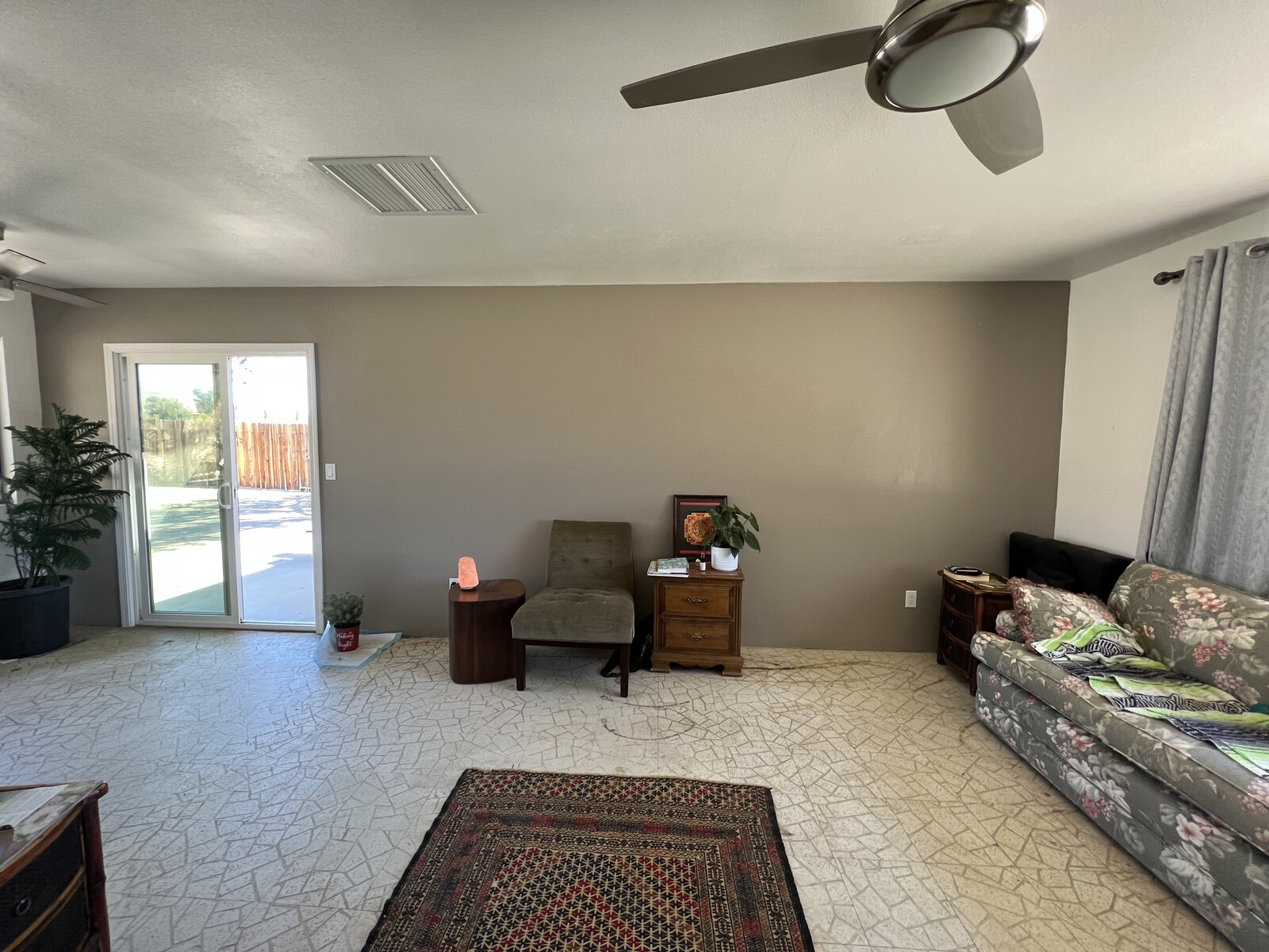 Before: "The house was very suburban: drop ceiling, grey accent walls, and didn't feel special or loved,