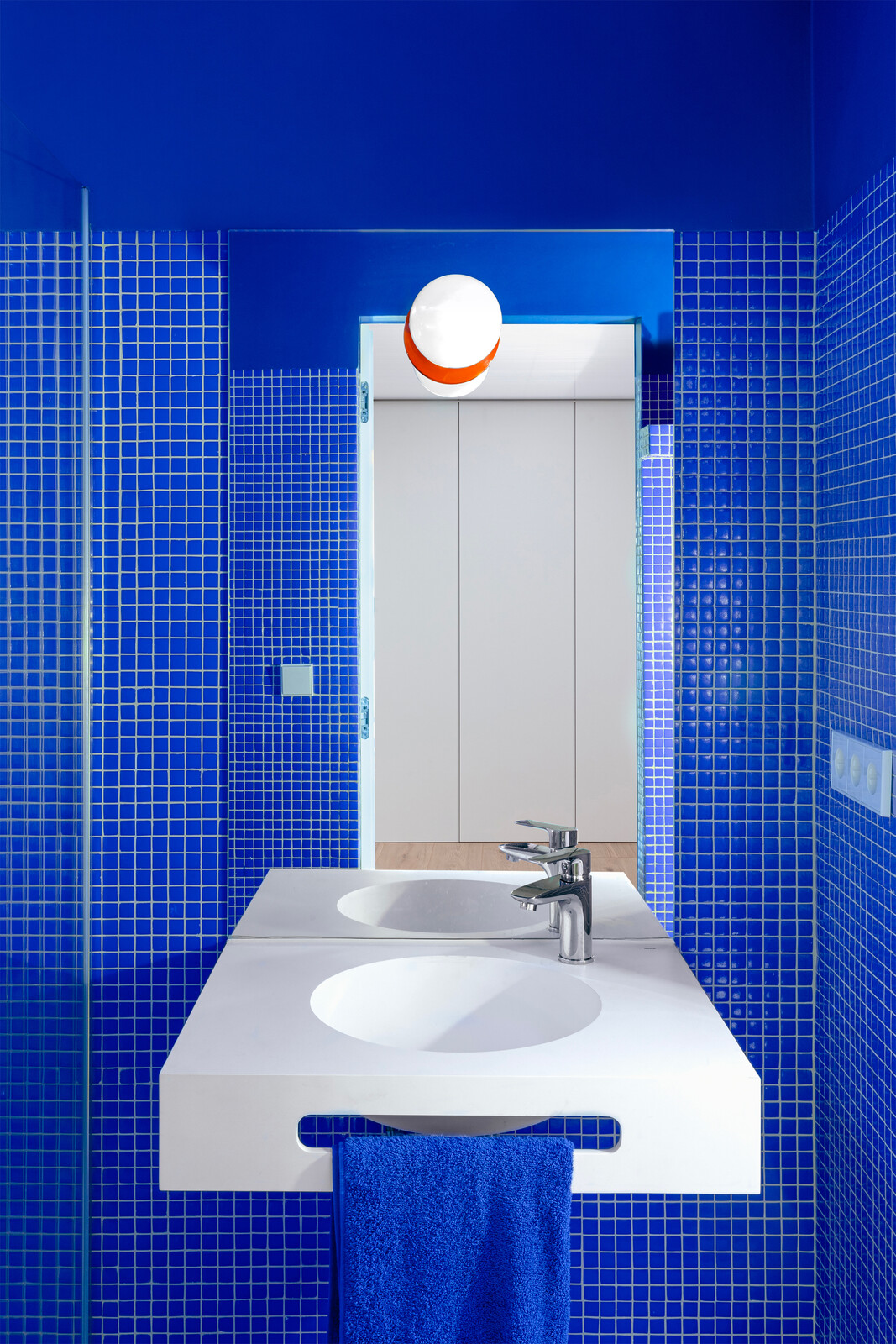 Now, the blue bathroom is one of the homeowners' favorite spaces. "We love showering in our blue cabin,