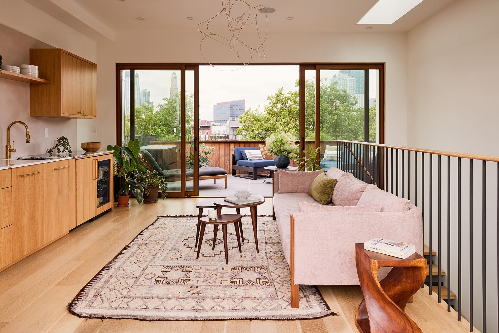 The penthouse level contains a new kitchenette and opens to a front and back terrace.