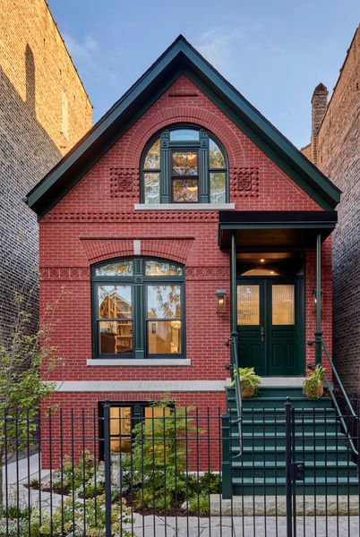 Working with local company Bricks Incorporated, the designers faithfully recreated the home's original brick facade, including custom-made decorative shapes to match the historic condition.