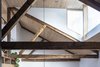 Modern home with Living Room and Pendant Lighting. Existing roof trusses were exposed Photo 12 of Arklow Villa III