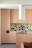 Modern home with Kitchen, Tile Counter, Colorful Cabinet, and Ceramic Tile Backsplashe. Kitchen set Photo 3 of Apartment, 62 sq. meters in St. Petersburg