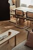 Modern home with Living Room, Medium Hardwood Floor, and Chair. Dinner zone Photo 7 of Apartment, 62 sq. meters in St. Petersburg