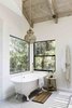Modern home with Bath Room, Engineered Quartz Counter, Open Shower, Freestanding Tub, Undermount Sink, Concrete Floor, One Piece Toilet, Pendant Lighting, and Ceramic Tile Wall. my dream bathroom Photo 8 of Bonny Doon Forest Temple