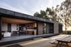 Modern home with Kitchen, Wood Cabinet, and Ceramic Tile Floor. View from the pool Photo 3 of AGLAE HOUSE by AFARQ Arquitectos