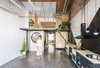 Modern home with Kitchen, Wood Counter, Metal Counter, Open Cabinet, Metal Cabinet, Concrete Floor, and Pendant Lighting. Up House by CumuloLimbo Studio Photo of #UPHouse