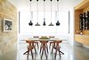 Modern home with Dining Room, Chair, Ceiling Lighting, Concrete Floor, Table, Recessed Lighting, Storage, Pendant Lighting, and Shelves. Lago Vista by Dick Clark + Associates Photo 9 of Lago Vista