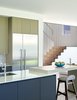 Modern home with Kitchen, Recessed Lighting, Wood Cabinet, Stone Counter, Subway Tile Backsplashe, Concrete Floor, Ceiling Lighting, Undermount Sink, and Refrigerator. 007 House by Dick Clark + Associates Photo 4 of 007 House