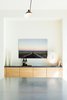 Modern home with Dining Room, Ceiling Lighting, Pendant Lighting, Storage, and Bar. Windsor Residence by Dick Clark + Associates Photo 8 of Windsor Residence