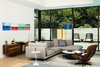 Modern home with Living Room, Chair, Sectional, Recessed Lighting, Coffee Tables, Ceiling Lighting, and Accent Lighting. Windsor Residence by Dick Clark + Associates Photo 7 of Windsor Residence