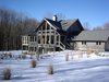 Modern home with Exterior, Gable RoofLine, Shingles Roof Material, and House Building Type. Aquarius 1, Mass Timber Solar Enertia® Home in Winter, in Western Connecticut
Photo of Aquarius 1 Mass Timber Geo-Solar home by Enertia®