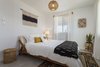 Modern home with Porcelain Tile Floor, Ceiling Lighting, and Pendant Lighting. After: The Bedroom Photo 13 of Mojave Mesa House