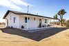 Modern home with Exterior, House Building Type, Cabin Building Type, Wood Siding Material, and Shingles Roof Material. After: The Mojave Mesa House Photo 2 of Mojave Mesa House