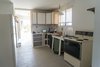 Modern home with Kitchen. Before: The Kitchen Photo 12 of Mojave Mesa House