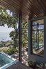 Modern home with Outdoor, Decking Patio, Porch, Deck, Metal Patio, Porch, Deck, Small Pools, Tubs, Shower, Wood Patio, Porch, Deck, Grass, Front Yard, and Trees. designed by Estúdio Minke Photo 3 of Casa da Pedra (The stone house)
