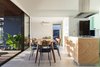 Modern home with Kitchen, Ceramic Tile Backsplashe, Quartzite Counter, Pendant Lighting, Tile Counter, Ceramic Tile Floor, Drop In Sink, Porcelain Tile Floor, Wood Cabinet, Wall Lighting, Cooktops, Wood Counter, Colorful Cabinet, and Ceiling Lighting. designed by Estúdio Minke Photo 6 of Casa da Pedra (The stone house)