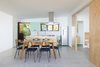 Modern home with Ceramic Tile Floor, Porcelain Tile Floor, Wall Lighting, Ceiling Lighting, and Chair. designed by Estúdio Minke Photo 13 of Casa da Pedra (The stone house)