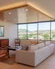 Modern home with Living Room, Accent Lighting, Ceiling Lighting, and Light Hardwood Floor. Iconic views of Diamond Head, surrounding neighborhood, malls & shops Photo 2 of Scott Residence