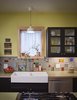 Modern home with Kitchen, Ceramic Tile Backsplashe, Range, Wood Cabinet, Drop In Sink, Wood Counter, and Ceiling Lighting. Kitchen backsplash artwork. Photo 8 of Drake House