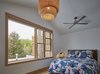 Modern home with Bedroom, Ceiling Lighting, and Bed. Bedroom. Photo 9 of Drake House