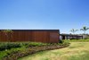 Modern home with Exterior, House Building Type, Metal Roof Material, Metal Siding Material, Wood Siding Material, Glass Siding Material, and Flat RoofLine. bedrooms block Photo 3 of Pindaibeiras House