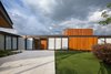 Modern home with Exterior, House Building Type, Flat RoofLine, Metal Roof Material, Metal Siding Material, Glass Siding Material, and Wood Siding Material. bedrooms patio Photo 16 of Pindaibeiras House