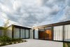 Modern home with Exterior, Metal Roof Material, House Building Type, Glass Siding Material, Metal Siding Material, and Flat RoofLine. bedrooms patio Photo 17 of Pindaibeiras House
