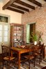 Modern home with Dining Room, Chair, Table Lighting, Table, Medium Hardwood Floor, Storage, and Ceiling Lighting. For the rare moments when you're not out enjoying New Orlean's amazing restaurants. Photo 8 of Antoine Bordeaux House