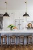 Modern home with Kitchen, White Cabinet, Wall Oven, and Refrigerator. Designed with a refreshing color palette and a classic charm, Kirsten Krason's kitchen features Big Chill's Classic Fridge in White with Satin Nickel trim and Big Chill's 36" Classic Stove in Custom Basalt Gray with Brushed Brass trim. Photo 2 of Stunning Kitchen Renovation by House of Jade