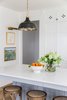 Modern home with Kitchen, Pendant Lighting, and White Cabinet. Kirsten Krason's kitchen provides an exemplary example of how white can be done right — lively, vibrant and refreshing with a little help from an accent color. Photo 6 of Stunning Kitchen Renovation by House of Jade