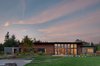 Modern home with Exterior, House Building Type, Farmhouse Building Type, Stone Siding Material, Concrete Siding Material, Metal Roof Material, Flat RoofLine, and Wood Siding Material. Olympia Prairie Home exteior Photo 13 of Olympia Prairie Home