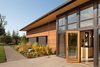 Modern home with Outdoor, Shrubs, Vegetables, Flowers, Trees, Gardens, and Front Yard. Olympia Prairie Home exterior Photo 7 of Olympia Prairie Home