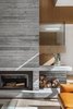 Modern home with Living Room, Wood Burning Fireplace, Sofa, and Medium Hardwood Floor. Living Room Fireplace & Feature Stair Details Photo 5 of Vancouver Island Residence