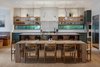 Modern home with Kitchen, Ceramic Tile Backsplashe, Engineered Quartz Counter, Undermount Sink, Wall Oven, Colorful Cabinet, Medium Hardwood Floor, Wood Cabinet, Refrigerator, and Pendant Lighting. Kitchen & Dining Area Photo 10 of Vancouver Island Residence